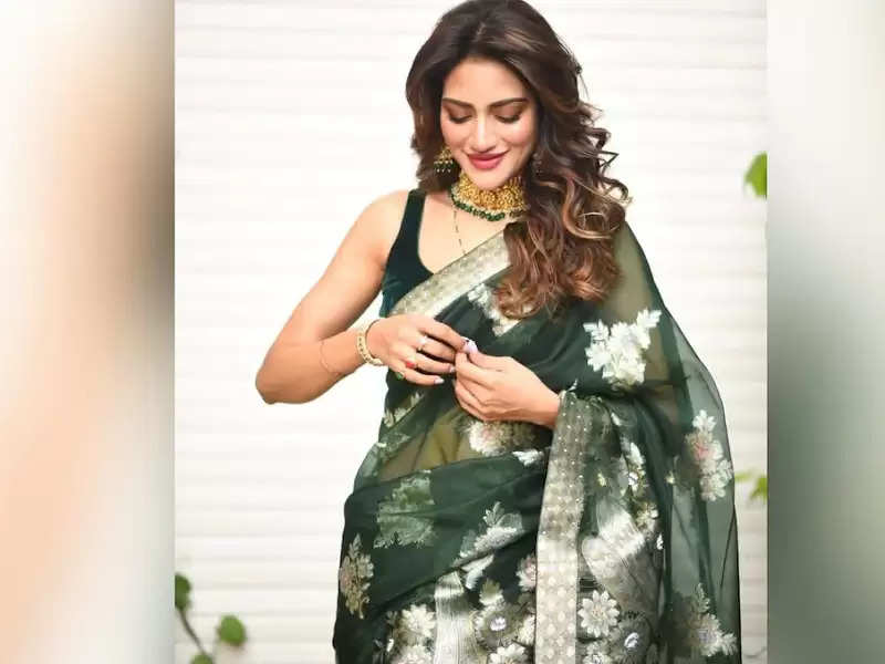 Photo Gallery: Nusrat Jahan flaunts her beauty in saree, See her ...