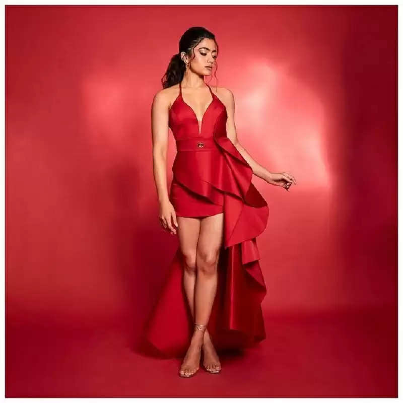 Rashmika Mandanna In A Sultry Red Dress Poses With Paparazzi At An Event