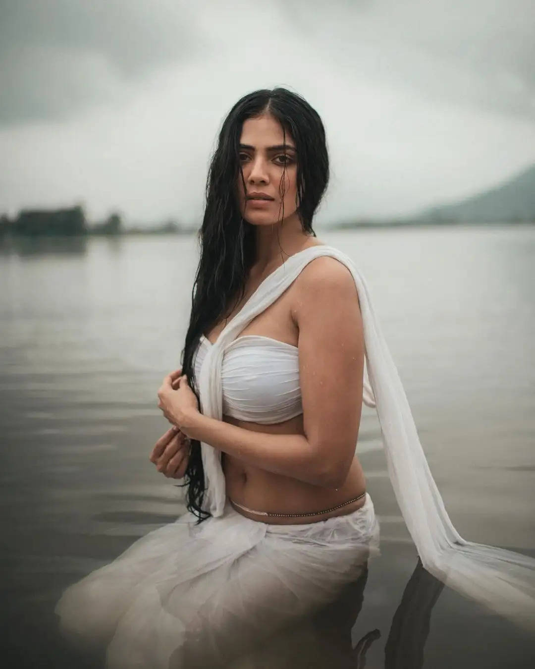 Malavika Mohanan looks in transparent saree photoshoot